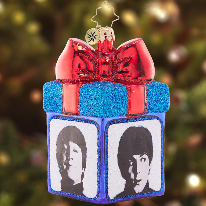 Ornament Description - Gather 'Round for Gifting: George, Ringo, John, or Paul? You don't have to choose- the gang's all here to ring in the holidays with you! What surprise gift could they have brought you? Whatever it is, the best gift of all is the iconic music of the Beatles.
