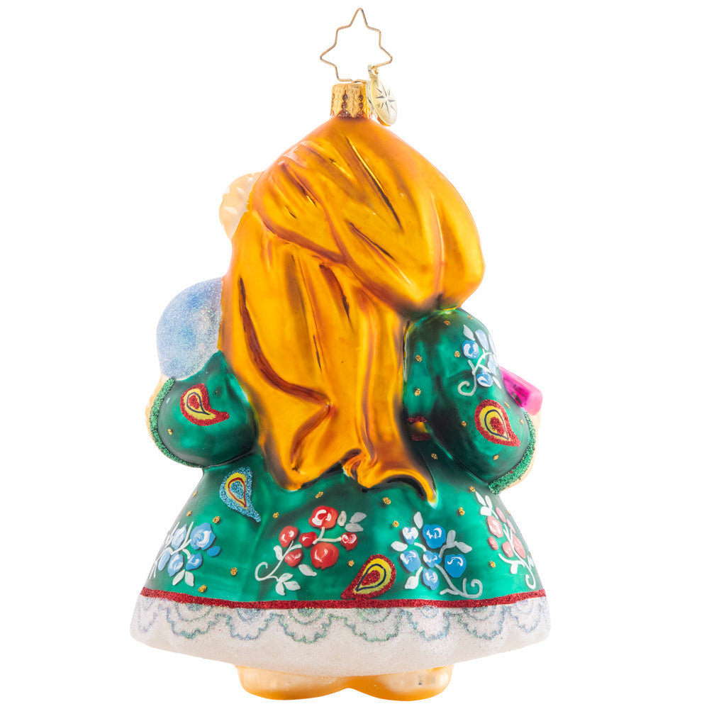 Back - Ornament Description - Muffy's Fortune: Would you allow Muffy to read your future? That's the question with our beautiful Muffy ornament bedecked in all her most glamourous Fortune-teller Fashion. With all the detail of her gorgeous gown, apron, headwrap, and ear hoops, the New Year looks bright and promising!