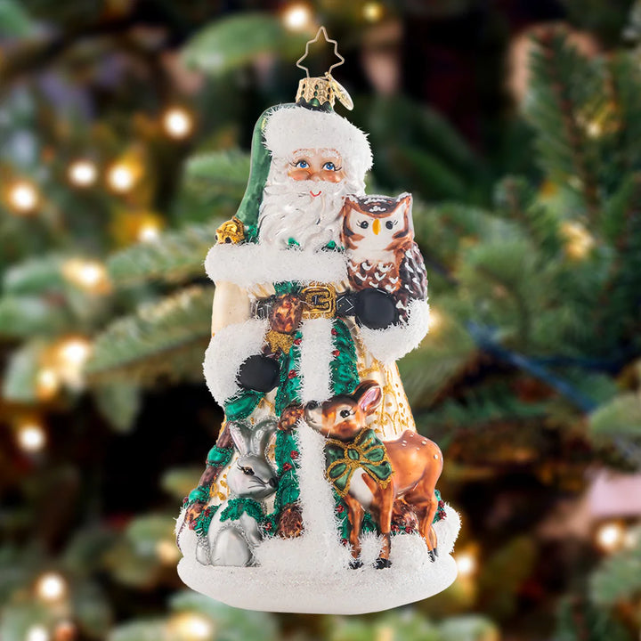 Ornament Description - Woodland Friends Santa: Swathed in evergreen robes, Santa is surrounded by his many adorable woodland friends. He loves to stroll through the snowy forest to appreciate the winter season.