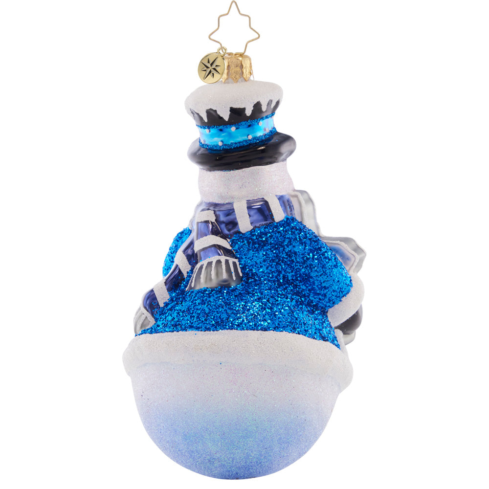 Back - Ornament Description - Flakey Frosty: Showing off his stunning star-shaped snowflake, this frosty friend is a vibrant vision in blue.