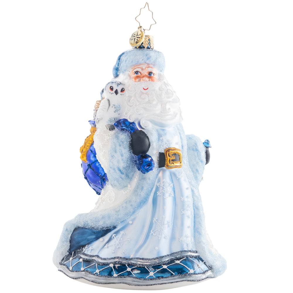 Front - Ornament Description - Winter Wonderland Santa: Strutting in a winter wonderland…Santa strolls comfortably with his bejeweled staff and cozy ice-blue coat. His owl friend sits atop his shoulder to keep him company.