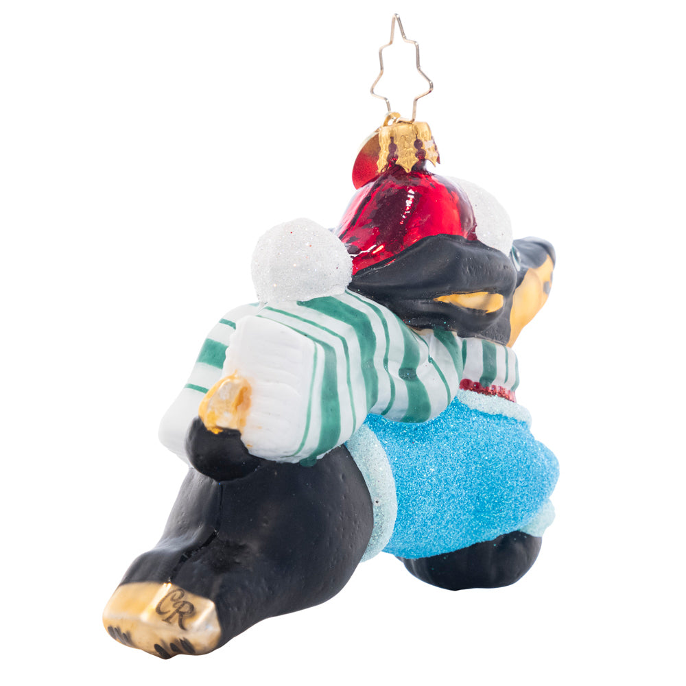 Back - Ornament Description - Santa Paws: Dog gone! This prancing pooch is looking cheerful as ever in a Christmas sweater and Santa hat.