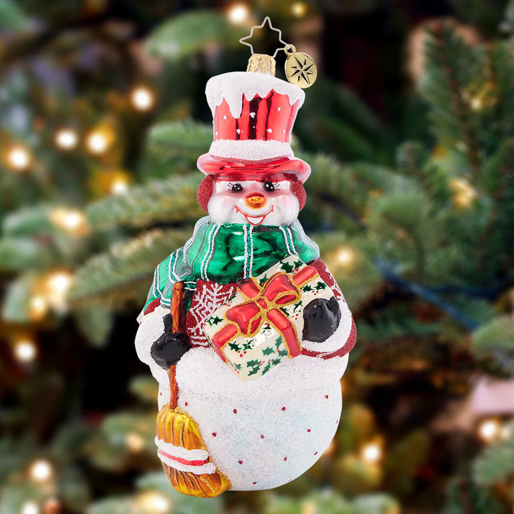 Ornament Description - Christmas Joy Snowman: With rosy snow-cheeks aglow with Christmas cheer, this top-hat snowman is sweeping and grinning ear-to-ear!