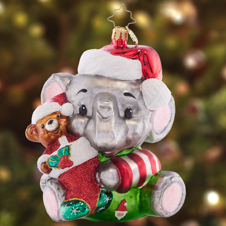 Ornament Description - Ellie's First Christmas: Accompanied by his teddy bear friend, this cute little elephant is ready for bed!