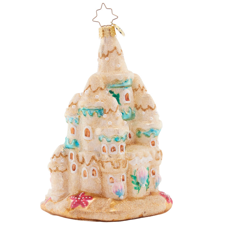 Back - Ornament Description - Castle in the Sand: This beautifully-built Sandcastle is an idyllic home for all the little beach-dwelling creatures. Just watch out when the tide comes in!