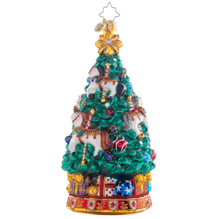 Back - Ornament Description - Carousel Christmas Tree: As the carousel tree spins round and round, the sparkling horses twinkle among toys abound. Adorn your tree with this whimsical piece, and remember the joy of a classic carousel ride.