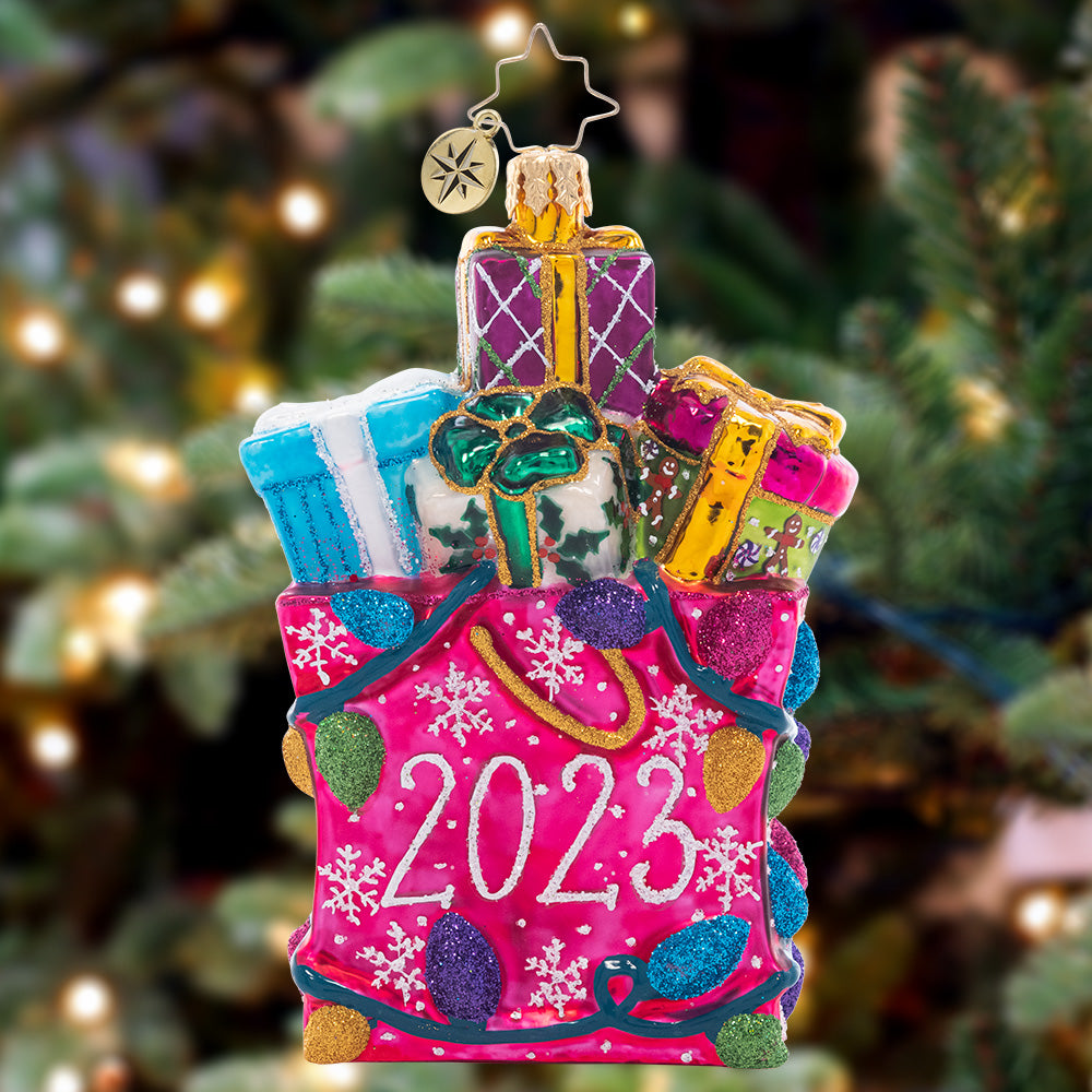 Ornament Description - No Time Like The Present 2023: Commemorate an exciting year with a bountiful stack of brightly-hued gifts! This beautiful piece is sure to make a great keepsake.
