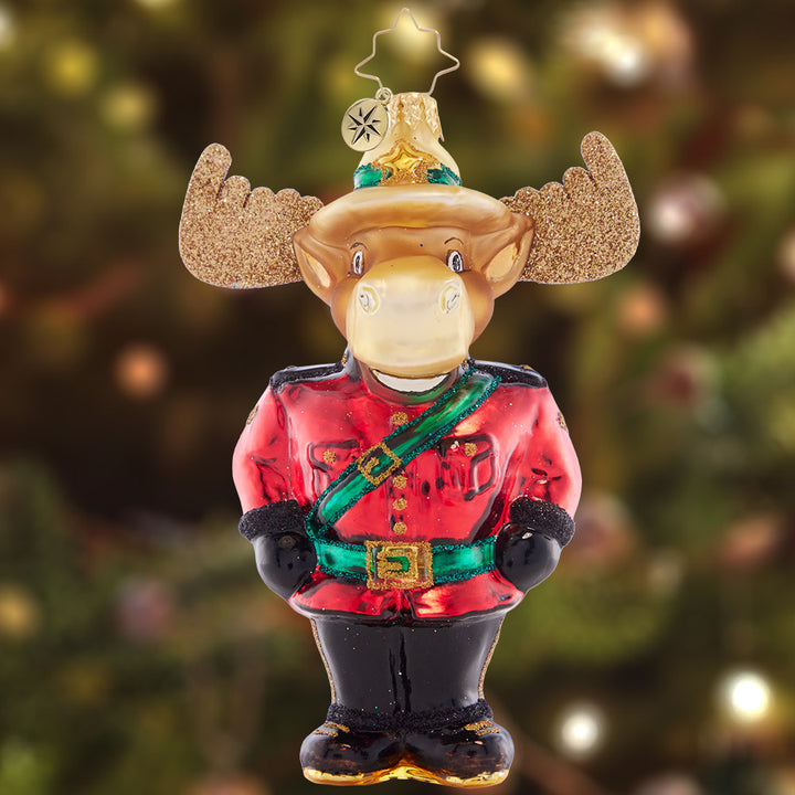 Ornament Description - Mountie Bruce Moose: Mountie Moose on the loose! This regal, red-coated Moose is a symbol of Canadian pride.