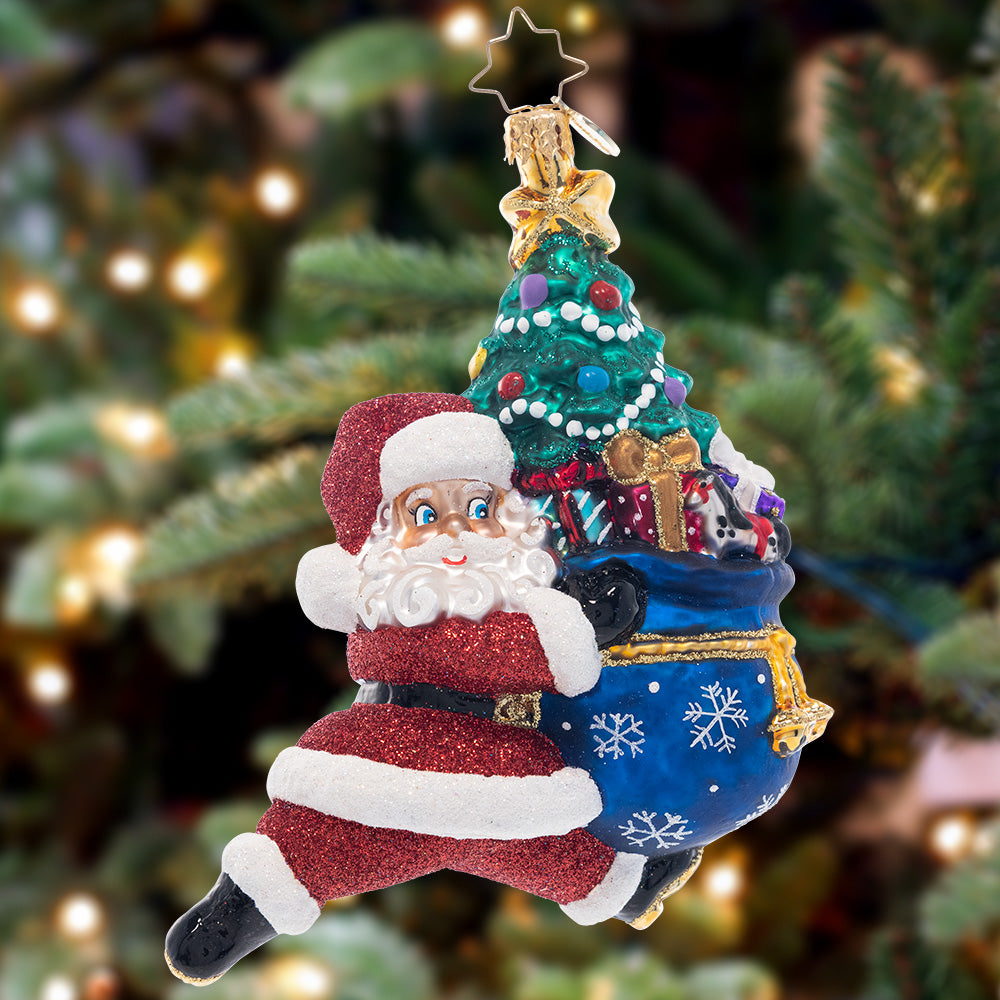 Ornament Description - Santa's Sprint: Dashing through the snow, indeed! The race is on for Santa to get all the gifts delivered on Christmas Eve. With the help of his speedy reindeer team, he's sure to complete the task on time.
