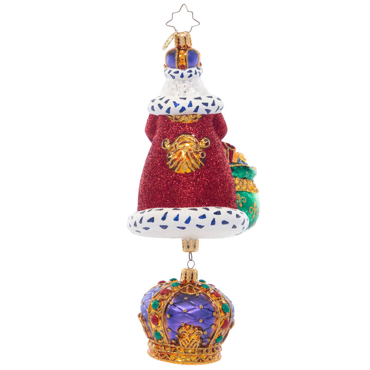 Back - Ornament Description - The King Of Christmas: With his luxurious, fur-lined robe, bag of golden gifts, and carefully-bejeweled crown, this royal Santa is sure to be the king of your Christmas tree. This special ornament has been hand-picked by the Radko team to be part of the Limited Edition collection.