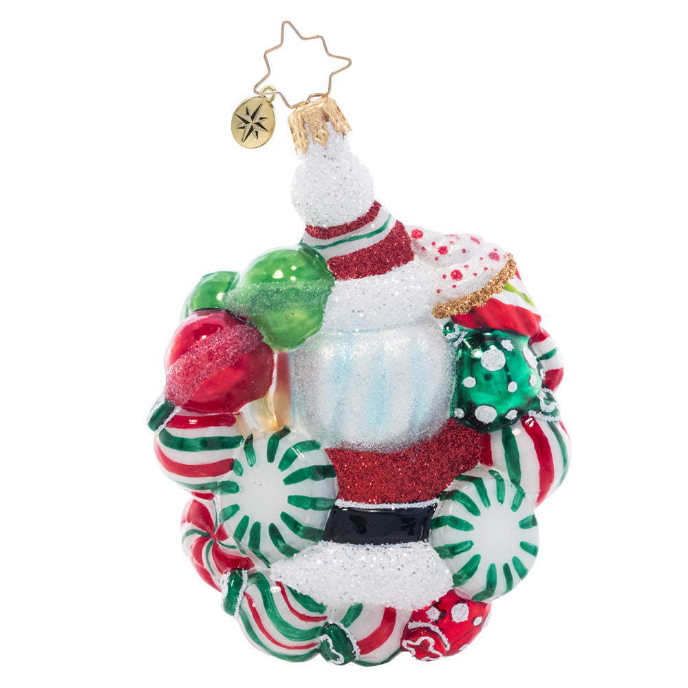 Back - Ornament Description - Peppermint Dreams Santa: This darling Santa is surrounded by a wreath of delicious peppermints. Decorate your tree with this candy-coated red and green treat!