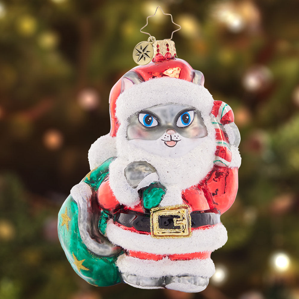 Ornament Description - Very Meow-y Christmas: Santa Claus? Or Santa Claws? This festive feline friend is here to help deliver presents and cheer.
