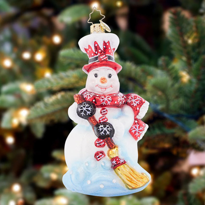 Ornament Description - Snowswept: This snowmen has a job that's neat, tidying up every snowed over street. He'll work hard to make sure your yard is as picturesque as a scenic postcard.