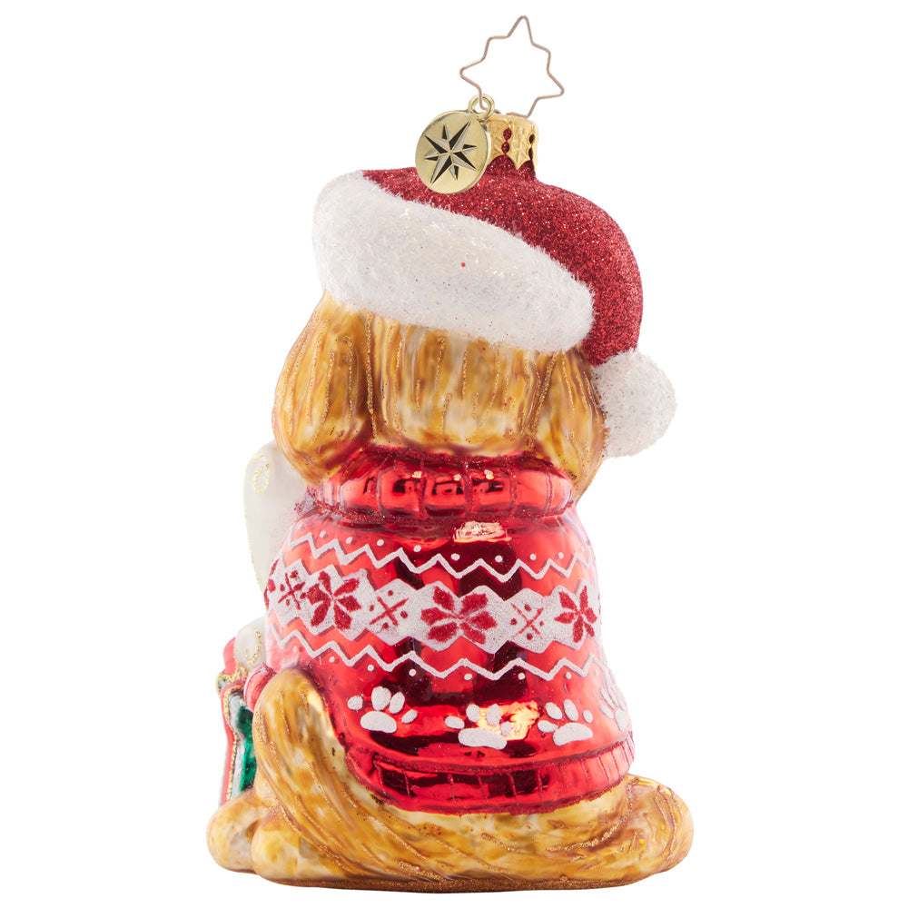Back - Ornament Description - Festive Furry Friend: When it comes to wrapping presents for the good little girls and boys, this friendly Fido is ready to lend Santa a helping paw!