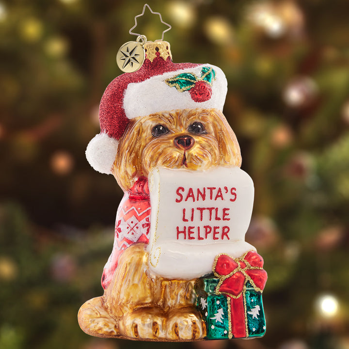 Ornament Description - Festive Furry Friend: When it comes to wrapping presents for the good little girls and boys, this friendly Fido is ready to lend Santa a helping paw!