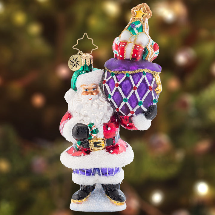Ornament Description - Sweet Treats Santa: Santa is feeling extra sweet, with lots of sugary treats. He'll make sure your tummy is filled with tasty candies, until your Christmas sweet tooth is completely satisfied!
