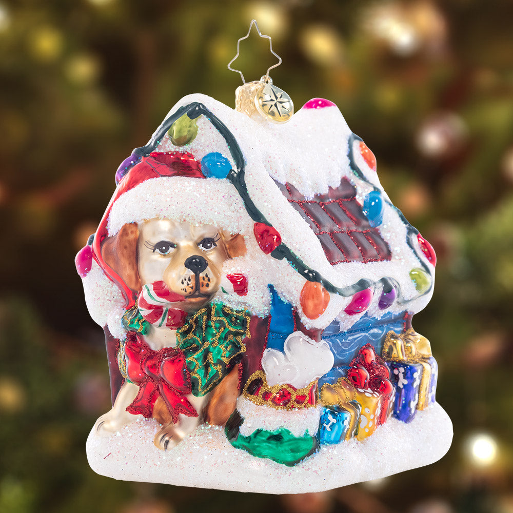 Ornament Description - Happy Howl-idays: Decked out with Christmas lights and a bone-laden wreath, this dog house is as cozy as can be!
