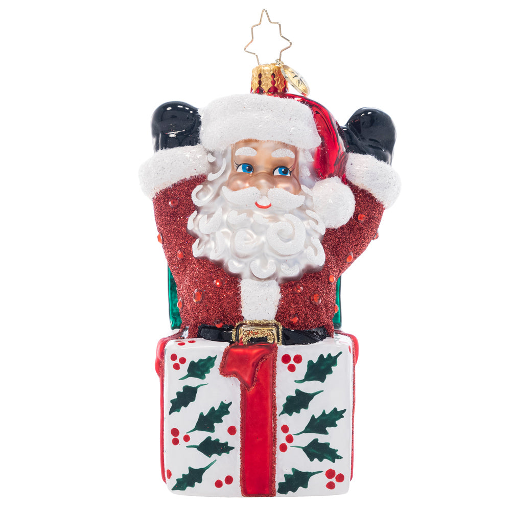 Front - Ornament Description - Santa-In-The-Box: Pop-goes-the-Santa! This jolly fellow is the most wonderful Christmas surprise, popping out of a holly-decked gift box.
