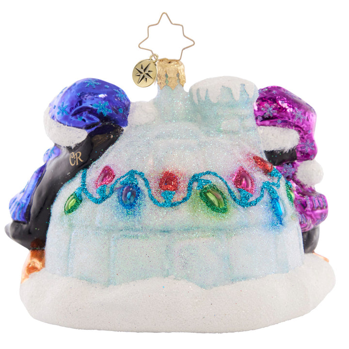 Back - Ornament Description - Welcome Home Igloo: This pair of penguins have adorned their icy igloo in holiday lights, read to greet Santa on Christmas Eve!