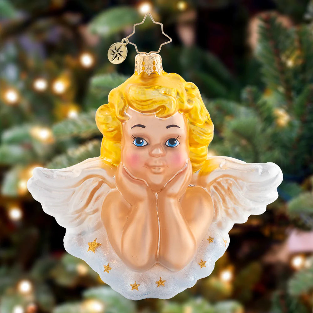 Ornament Description - Darling Guardian Angel: This cheerful cherub lights up the Christmas tree, an angelic addition to your holiday décor.