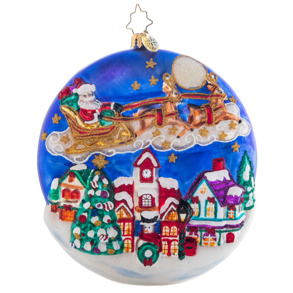 Front - Ornament Description - The Night Before Christmas: Over silent, snow-covered rooftops Santa soars, making his wonderful gift deliveries all around the world. This detailed round depicts a traditional Christmas story cherished by many.