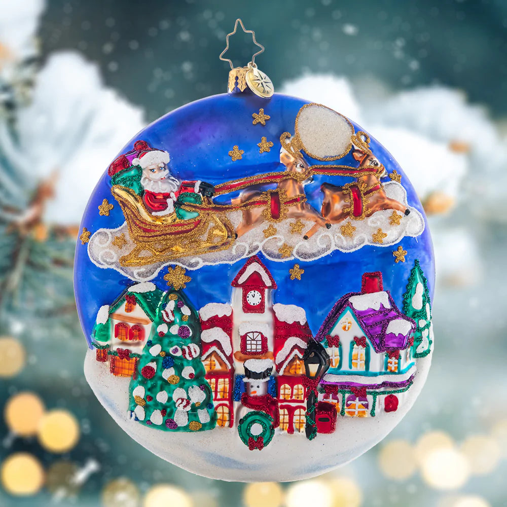 Ornament Description - The Night Before Christmas: Over silent, snow-covered rooftops Santa soars, making his wonderful gift deliveries all around the world. This detailed round depicts a traditional Christmas story cherished by many.