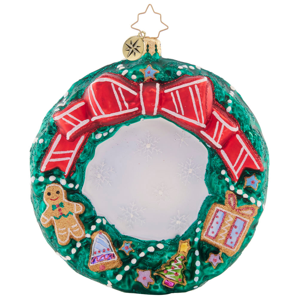 Back - Ornament Description - Cheerful Cookies Wreath: What better way to thank Santa for his hard work than with a cute, Christmas cookie-covered wreath? He's sure to enjoy this thoughtful and tasty treat.