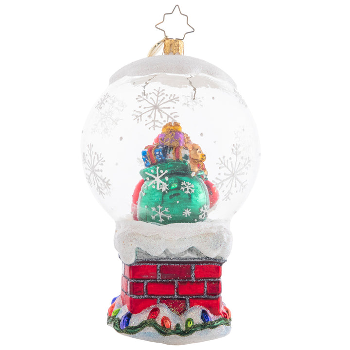 Back - Ornament Description - Up On The Housetop: It's a bit of a tight squeeze for Santa to fit down the chimney – not because he's been eating Christmas cookies, but because of his bountiful bag of gifts, of course!
