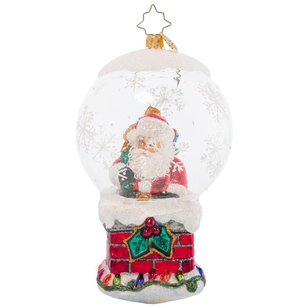 Front - Ornament Description - Up On The Housetop: It's a bit of a tight squeeze for Santa to fit down the chimney – not because he's been eating Christmas cookies, but because of his bountiful bag of gifts, of course!