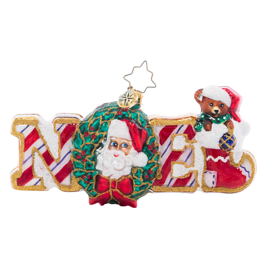 Front - Ornament Description - Christmas Traditions Noel: Spelling the traditional name for "Christmas" in sweet gingerbread and peppermint, this Noel ornament is the perfect way to celebrate the special day.