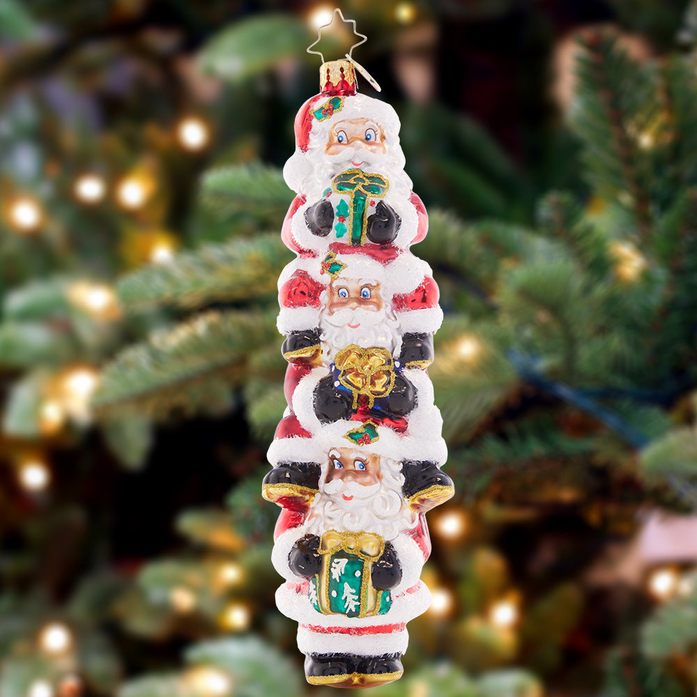 Ornament Description - Three Nicks Are Better Than One: Triple-decker Santas means triple the holiday fun! This silly stack of St. Nicks is a unique and cheerful addition to any tree.