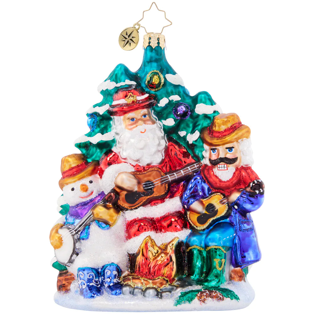 Front - Ornament Description - Santa's Fireside Friends: Gather 'round the campfire for a crackling Christmas carol. Santa, Snowman, and Nutcracker are a band of three ready to spread holiday glee!
