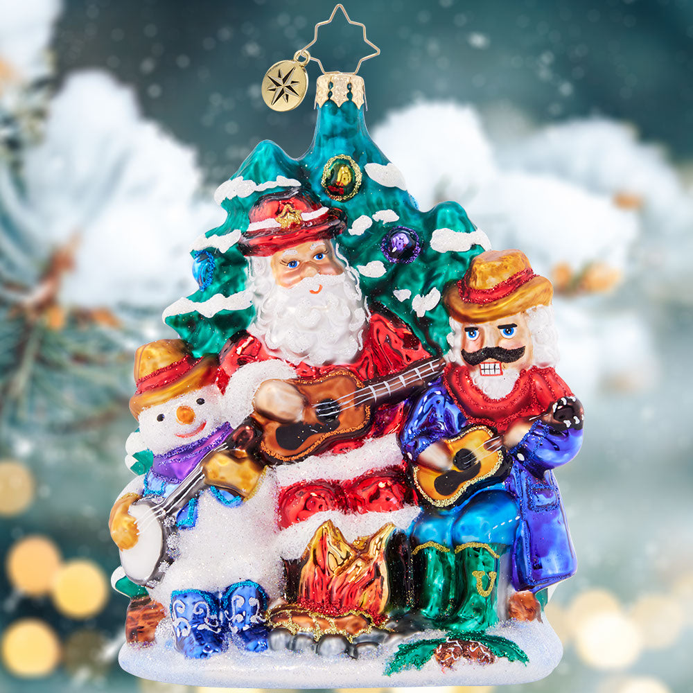 Ornament Description - Santa's Fireside Friends: Gather 'round the campfire for a crackling Christmas carol. Santa, Snowman, and Nutcracker are a band of three ready to spread holiday glee!