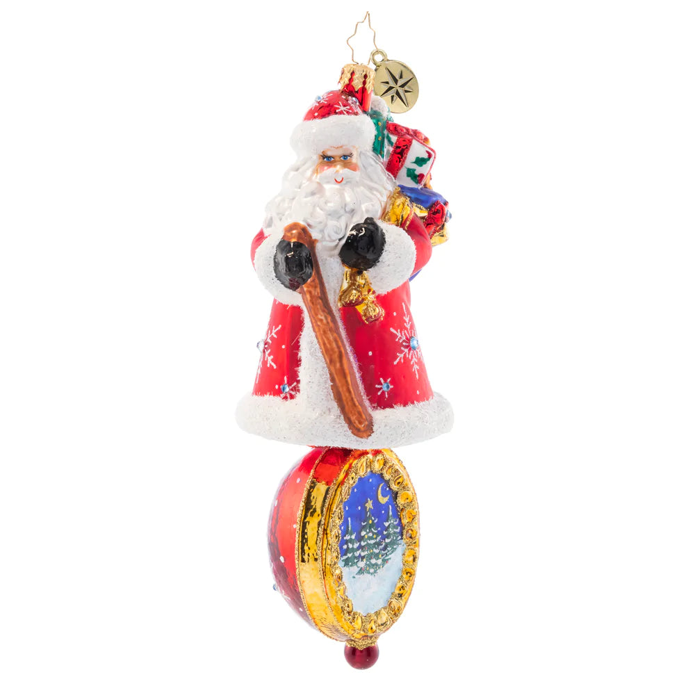 Front - Ornament Description - Christmas Charm Claus: Dressed head-to-toe in red robes and sparkling stars, this trustworthy Santa is the perfect guiding light to lead you through Christmas night.