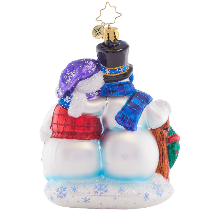 Back - Ornament Description - Snow in the Family: A happy snow family celebrates holiday traditions in this adorable ornament edition. Gathered together they'll share in the holiday cheer to celebrate another great year!