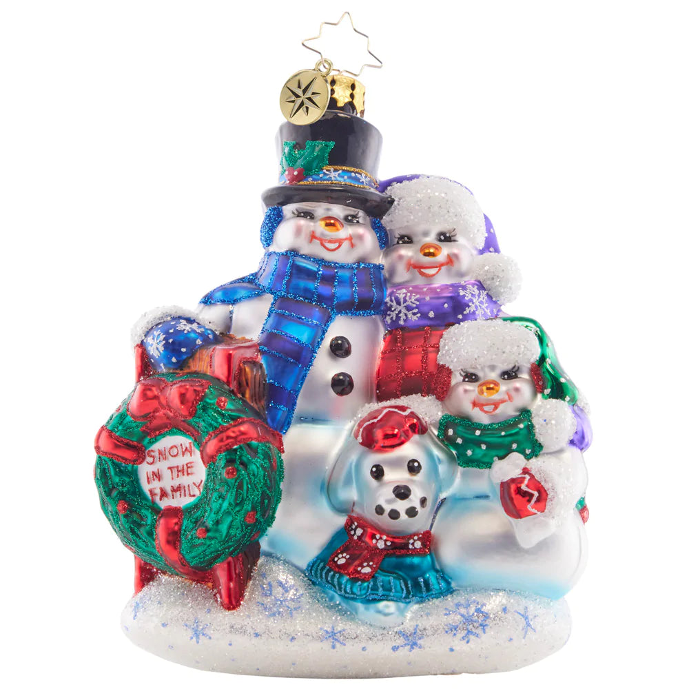 Front - Ornament Description - Snow in the Family: A happy snow family celebrates holiday traditions in this adorable ornament edition. Gathered together they'll share in the holiday cheer to celebrate another great year!