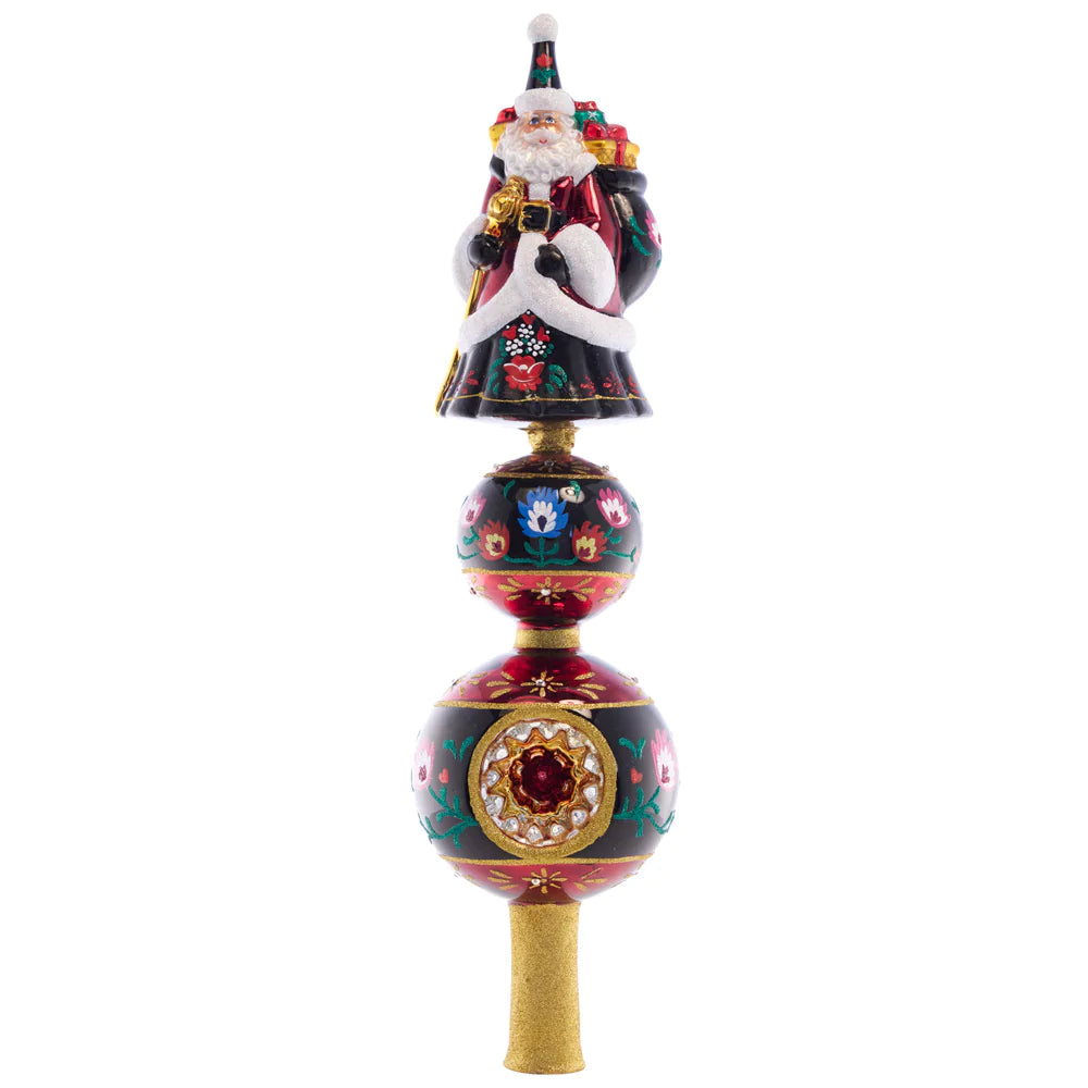 Front - Finial Description - Festive Folk Art Santa Finial: Our 2022 Designer's Choice ornament is back on top of the tree! Enjoy this beloved European Christmas folk art fairytale finial with a one-of-a-kind festive design.