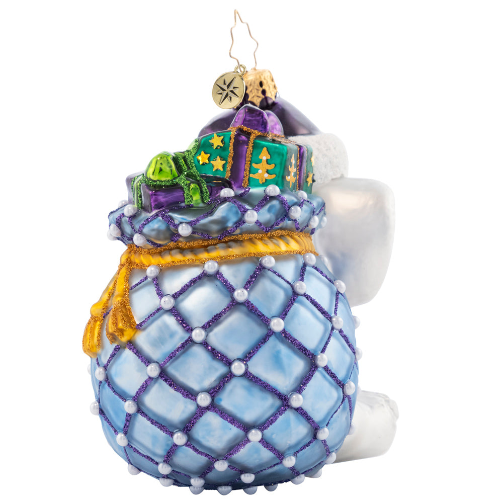 Back - Ornament Description - An Elephant Never Forgets!: An elephant who never forgets to treat others, no matter what they're going through, with compassion, love, and respect. A percentage of the sales from this ornament will benefit Alzheimer’s awareness.