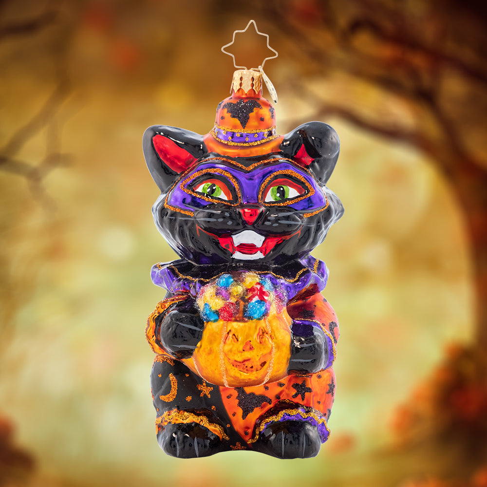 Ornament Description - Dapper Black Cat: A little trick-or-treater in peak Halloween style with this fancy feline smile!
