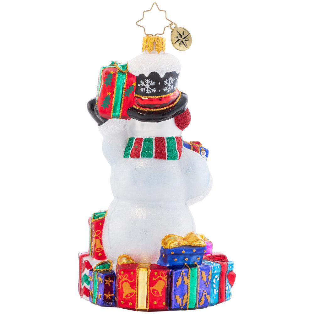 Back - Ornament Description - Wrapped And Ready Snowman: This festive snowman has a gift giving gameplan. He'll show up at your door to spread Christmas cheer galore.