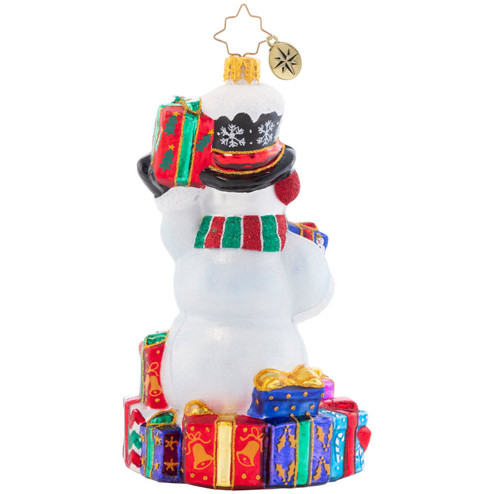 Back - Ornament Description - Wrapped And Ready Snowman: This festive snowman has a gift giving gameplan. He'll show up at your door to spread Christmas cheer galore.