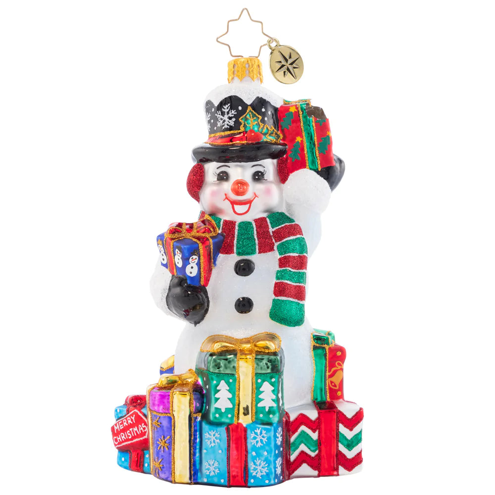 Front - Ornament Description - Wrapped And Ready Snowman: This festive snowman has a gift giving gameplan. He'll show up at your door to spread Christmas cheer galore.