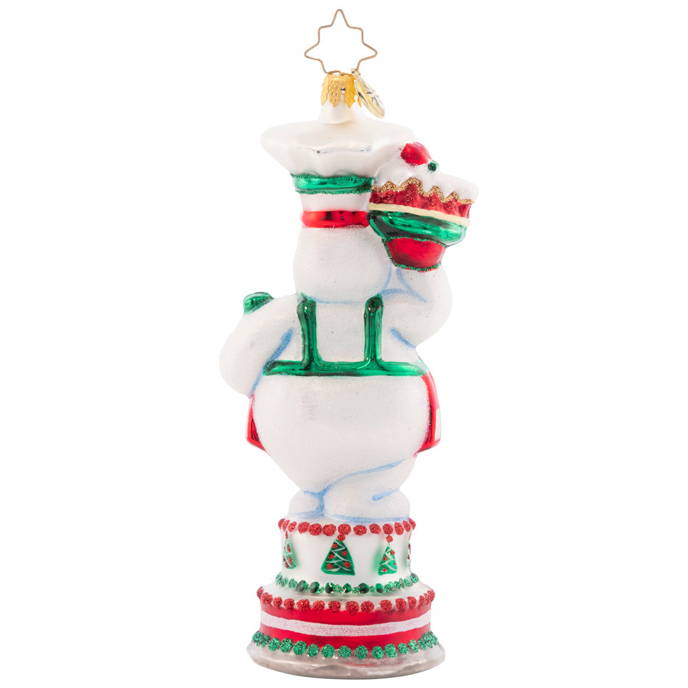 Back - Ornament Description - Cutie Pie Baker: This darling snow pal is the greatest cake maker. She uses cool icicle frosting so these baked goods are never defrosting. Join in the feast of this delicious sweet treat!