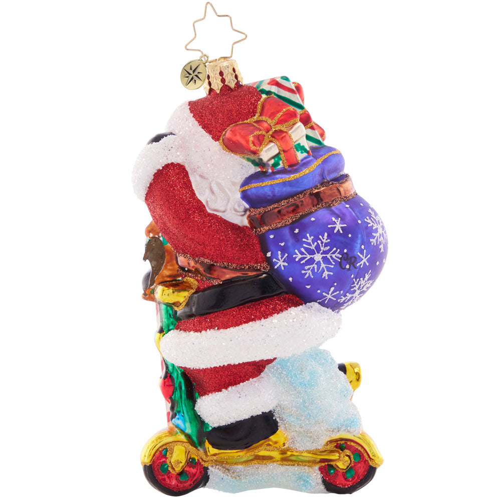 Back - Ornament Description - Scootin' Claus: Santa scoots along in style with this Christmas-colored ride. He's the coolest thing on two wheels this holiday season!