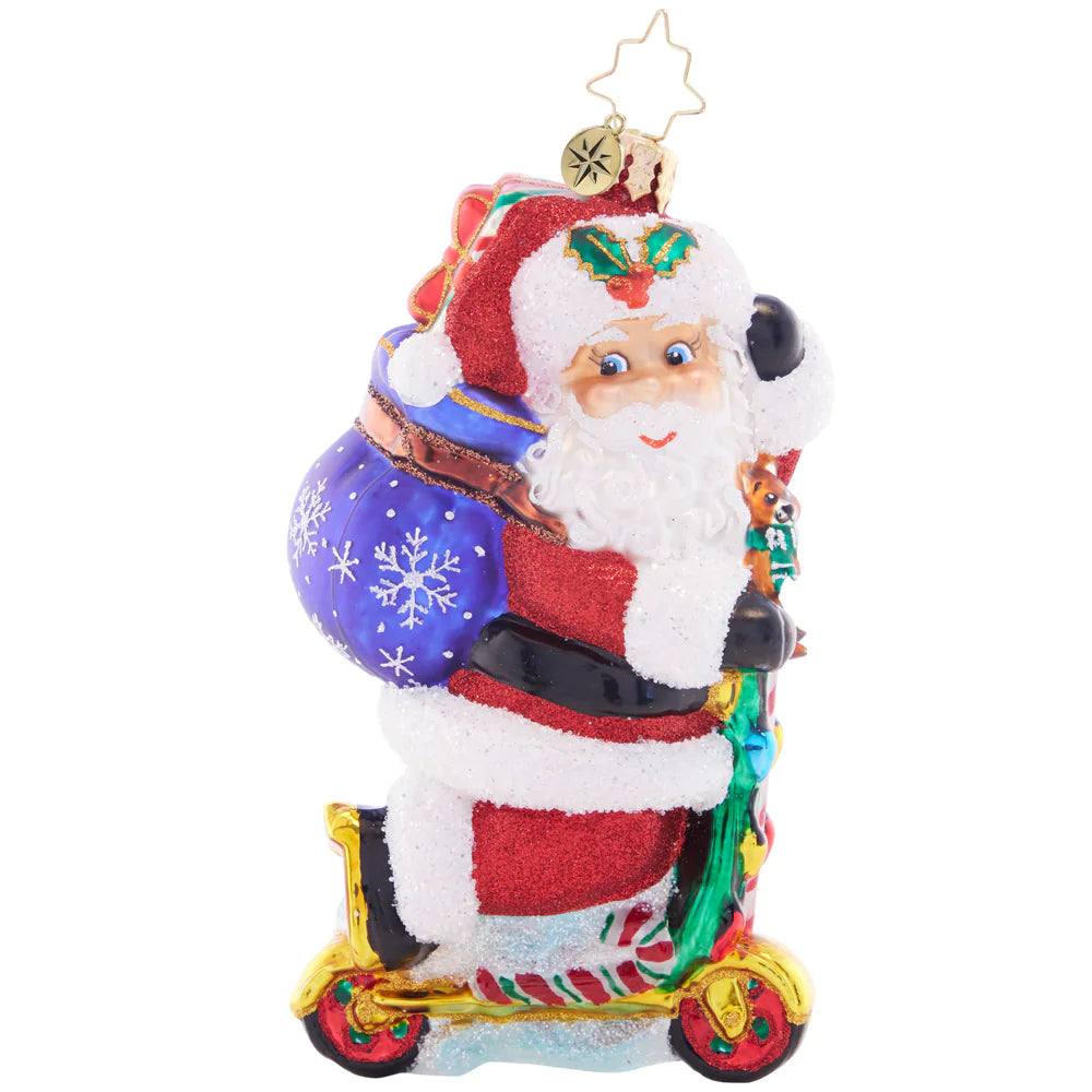 Front - Ornament Description - Scootin' Claus: Santa scoots along in style with this Christmas-colored ride. He's the coolest thing on two wheels this holiday season!