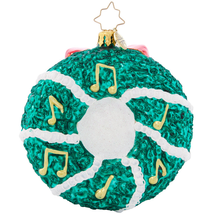Back - Ornament Description - Christmas Bells: Charmingly chiming with Christmas cheer, these beautiful golden bells add unique musicality to this classic evergreen wreath.