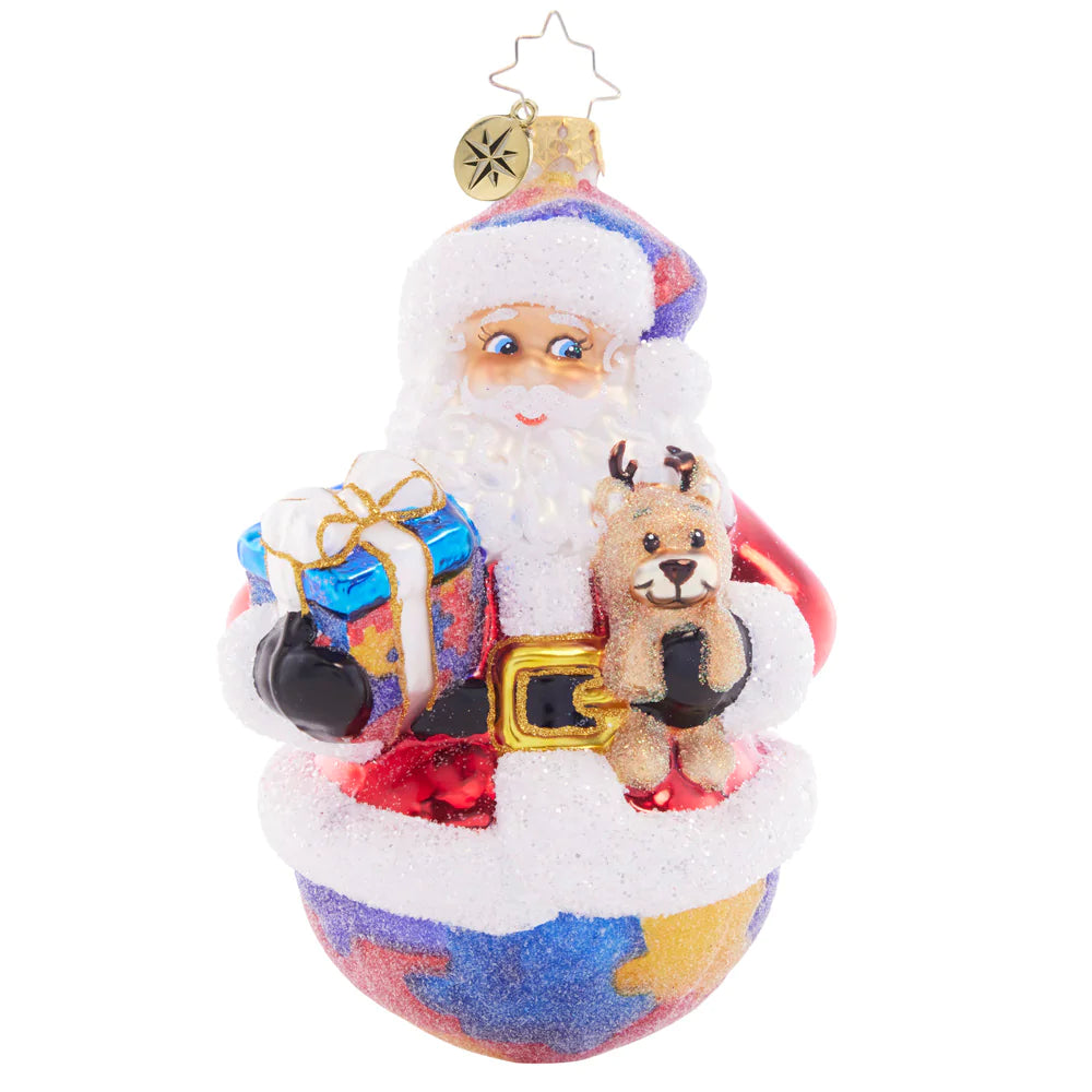 Front - Ornament Description - Perfect Pieces: This perfectly unique puzzle piece santa celebrates the strength and beauty of neurodiversity. A percentage of the sales from this ornament will benefit a charity that raises Autism awareness.