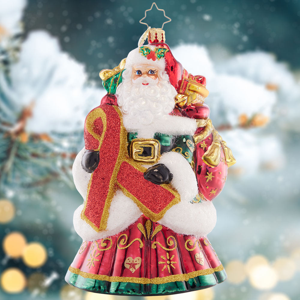 Ornament Description - Heart of Holiday Giving: Bearing a beautiful red ribbon, this Santa is a symbol of compassion and awareness for those affected by the AIDS virus. A percentage of proceeds from the sale of this ornament will benefit AIDS research.