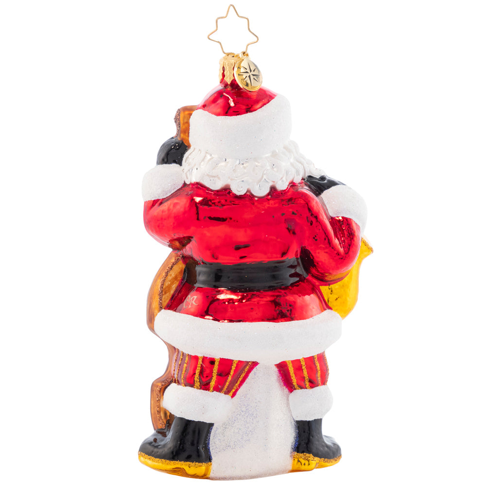 Back - Ornament Description - Merry Music Maker: Holding a saxophone and a standing bass, this Santa sure is extra jazzy! Adorn your tree with this whimsical piece and celebrate the songs of the holiday season.