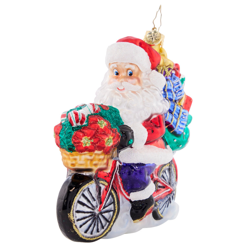 Front - Ornament Description - Santa's Ride Around Town: Cruising down the boulevard on his 10-speed, Santa is delivering perfectly-packed presents in eco-friendly style. Celebrate the cyclists in your life with this whimsical ornament!